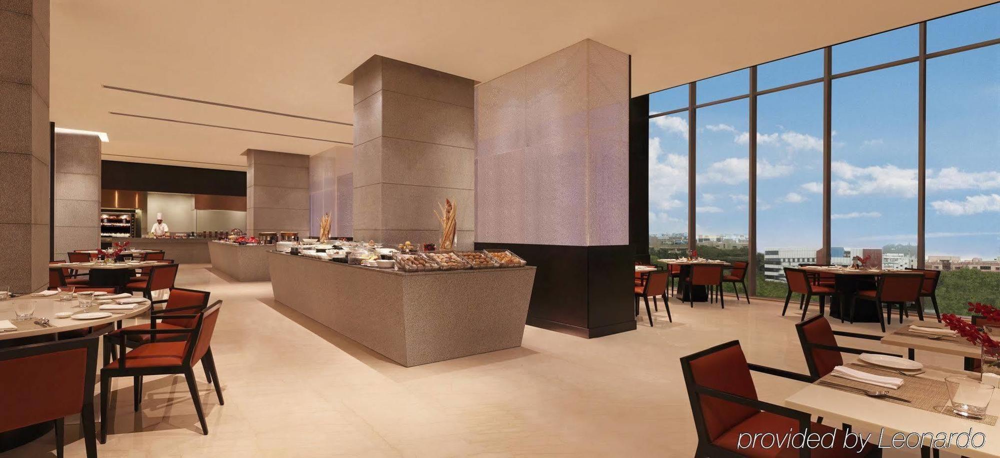 โรงแรมไทรเด็นท์ไฮเดอร์ราแบด ไฮเดอราบัด ภายนอก รูปภาพ The restaurant